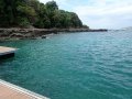 Saboga dock, shore dive site, Isla Pacheca at right in far distance